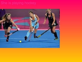 She is playing hockey
 