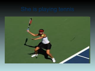 She is playing tennis
 