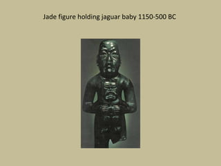 Jade figure holding jaguar baby 1150-500 BC
 