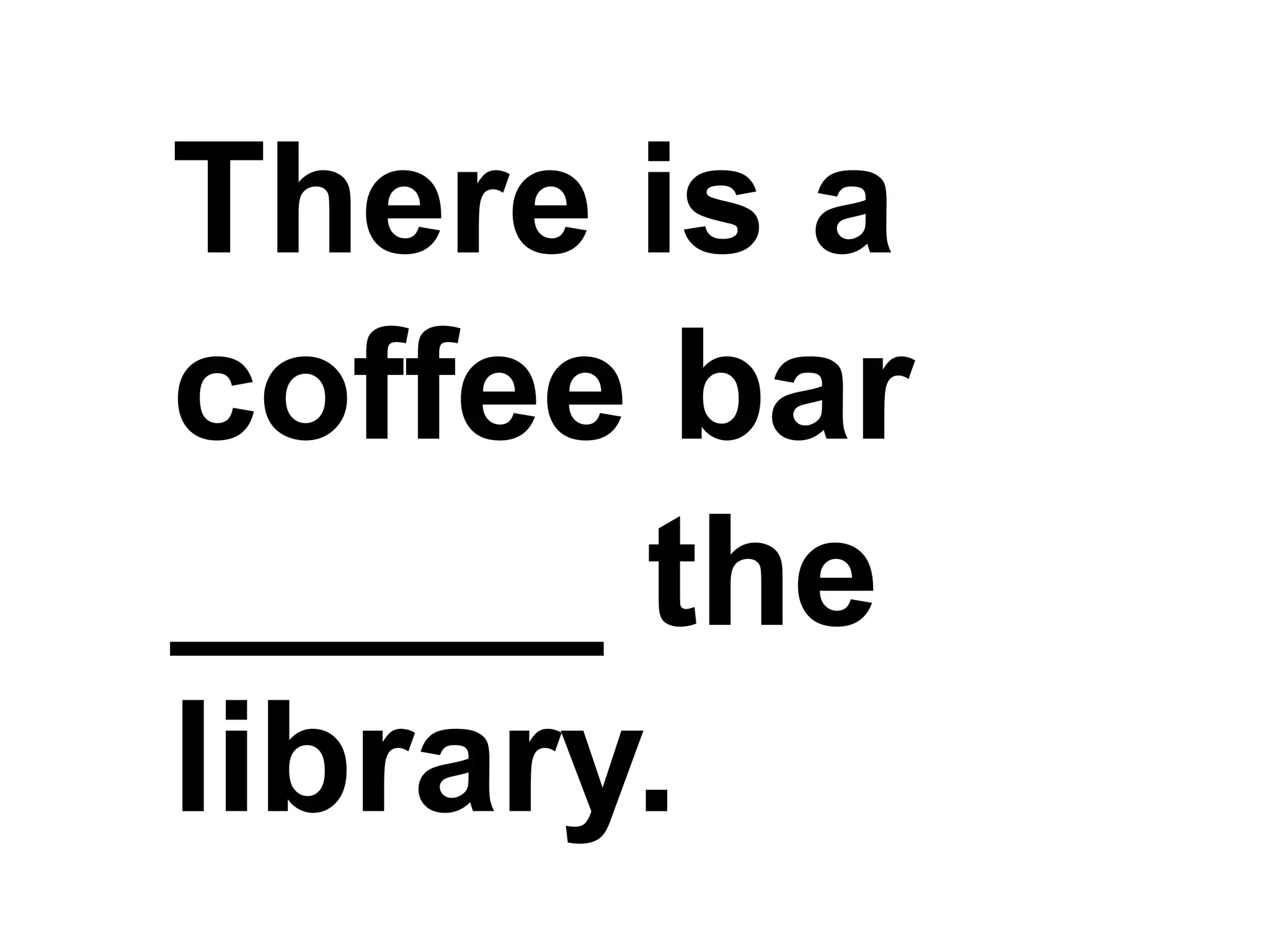 There is a coffee bar _____ the library.