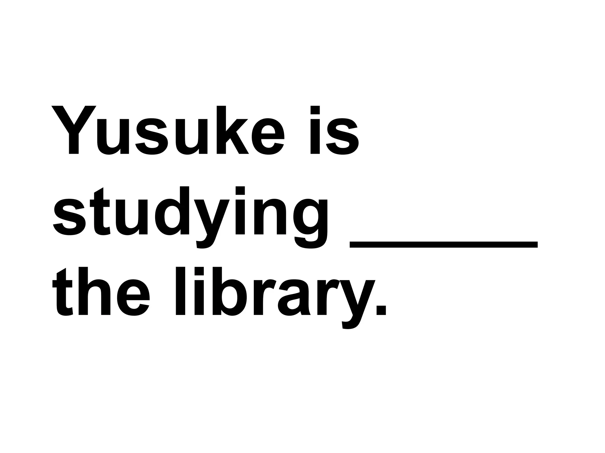 Yusuke is studying _____ the library.