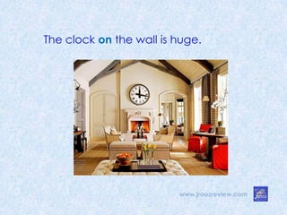www.jroozreview.com
The clock on the wall is huge.
 