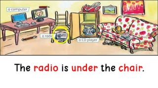 The radio is under the chair.
 
