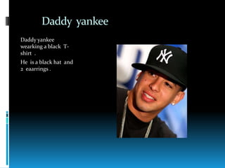 DaddyyankeeDaddyyankeewearking a black  T-shirt  .He  is a blackhat  and 2  eaarrings .