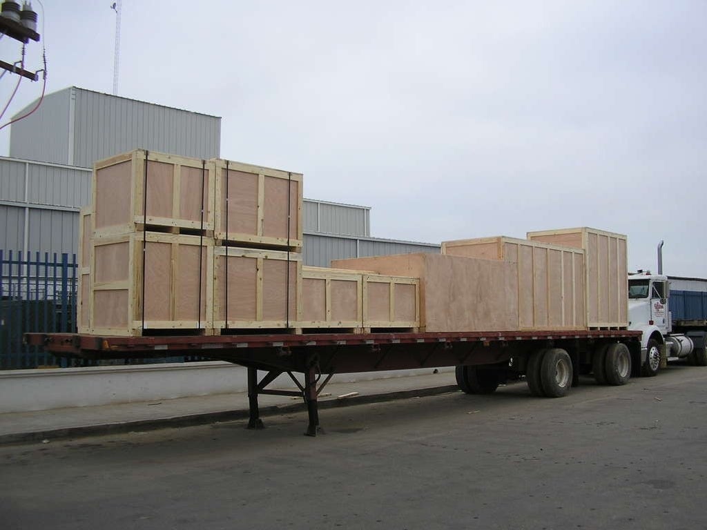 Wooden shipping boxes, skids, pallets, crates, and containers