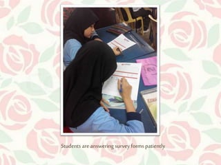 Students are answering survey forms patiently 
 