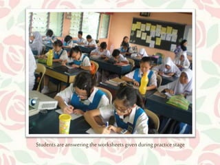 Students are answering the worksheets given during practice stage 
 