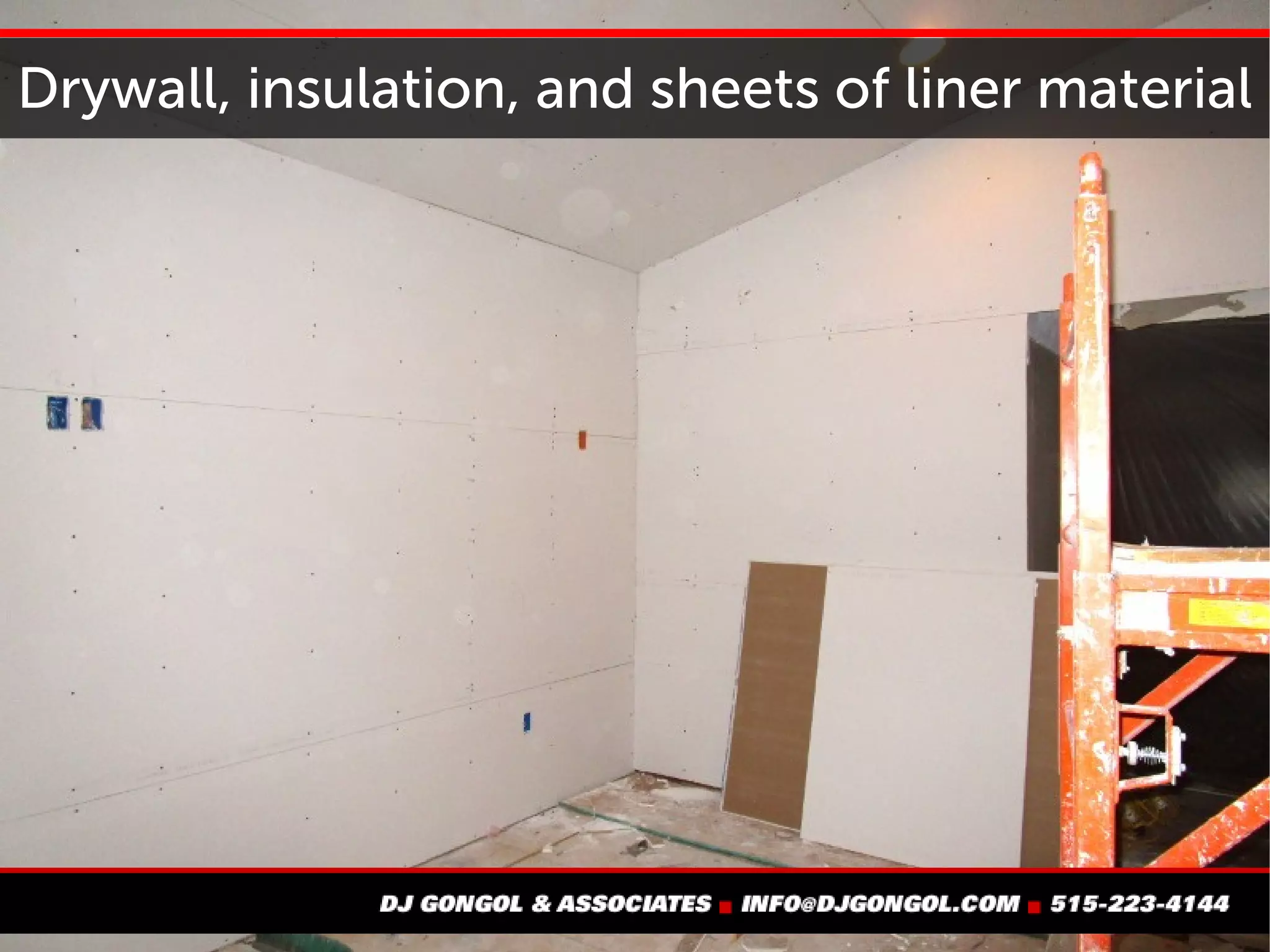 Drywall, insulation, and sheets of liner material
 