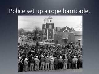 Police set up a rope barricade.

 