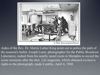 Aides of the Rev. Dr. Martin Luther King point out to police the path of
the assassin's bullet. Joseph Louw, photographer for the Public Broadcast
Laboratory, rushed from his nearby motel room in Memphis to record the
scene moments after the shot. Life magazine, which obtained exclusive
rights to the photograph, made it public. April 4, 1968.

 