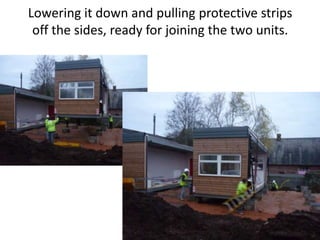 Lowering it down and pulling protective strips
 off the sides, ready for joining the two units.
 