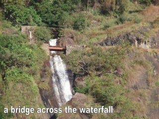 a bridge across the waterfall 