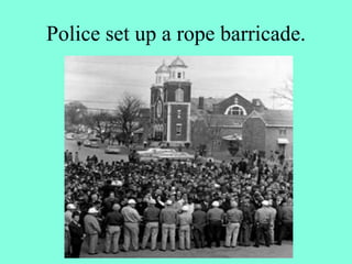 Police set up a rope barricade.
 