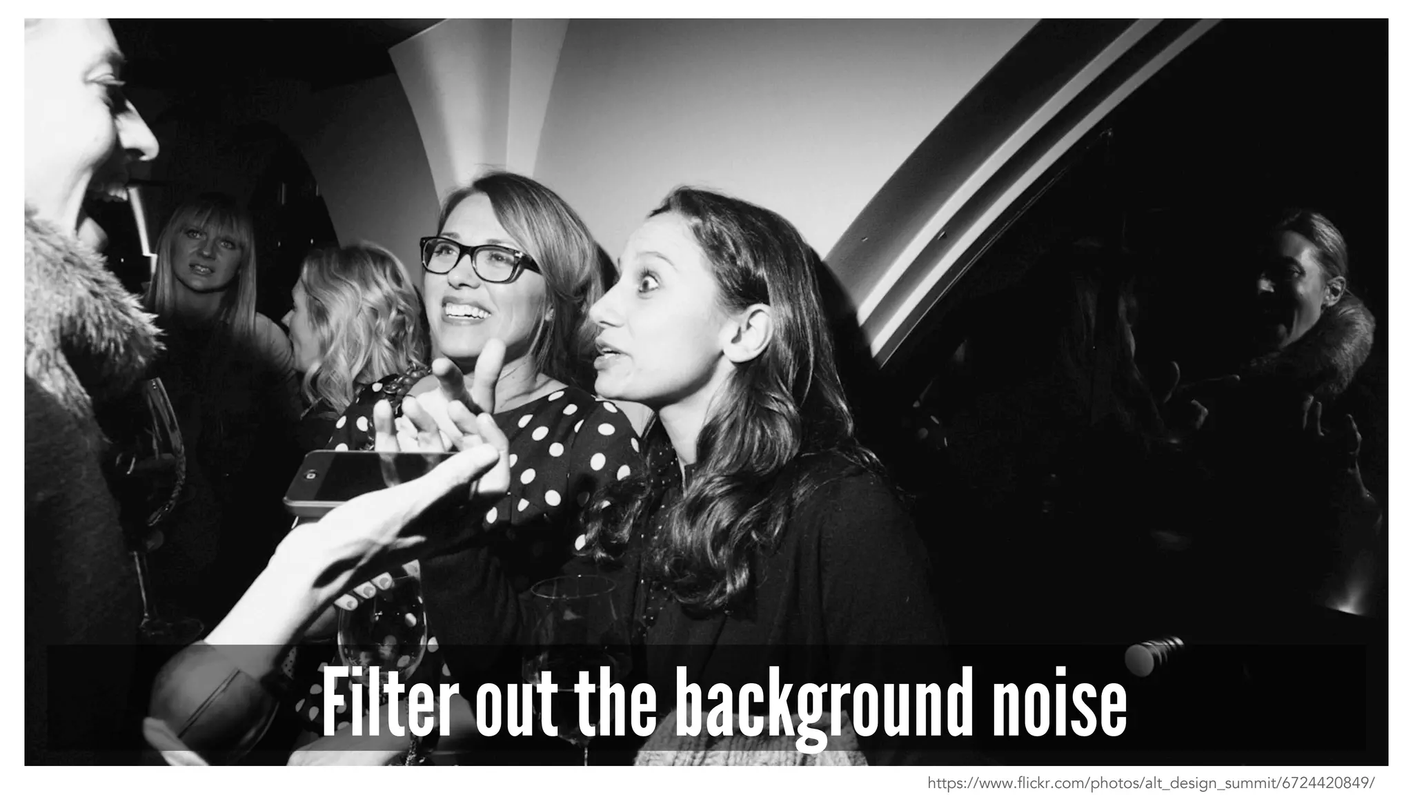 Filter out the background noise
https://www.flickr.com/photos/alt_design_summit/6724420849/
 