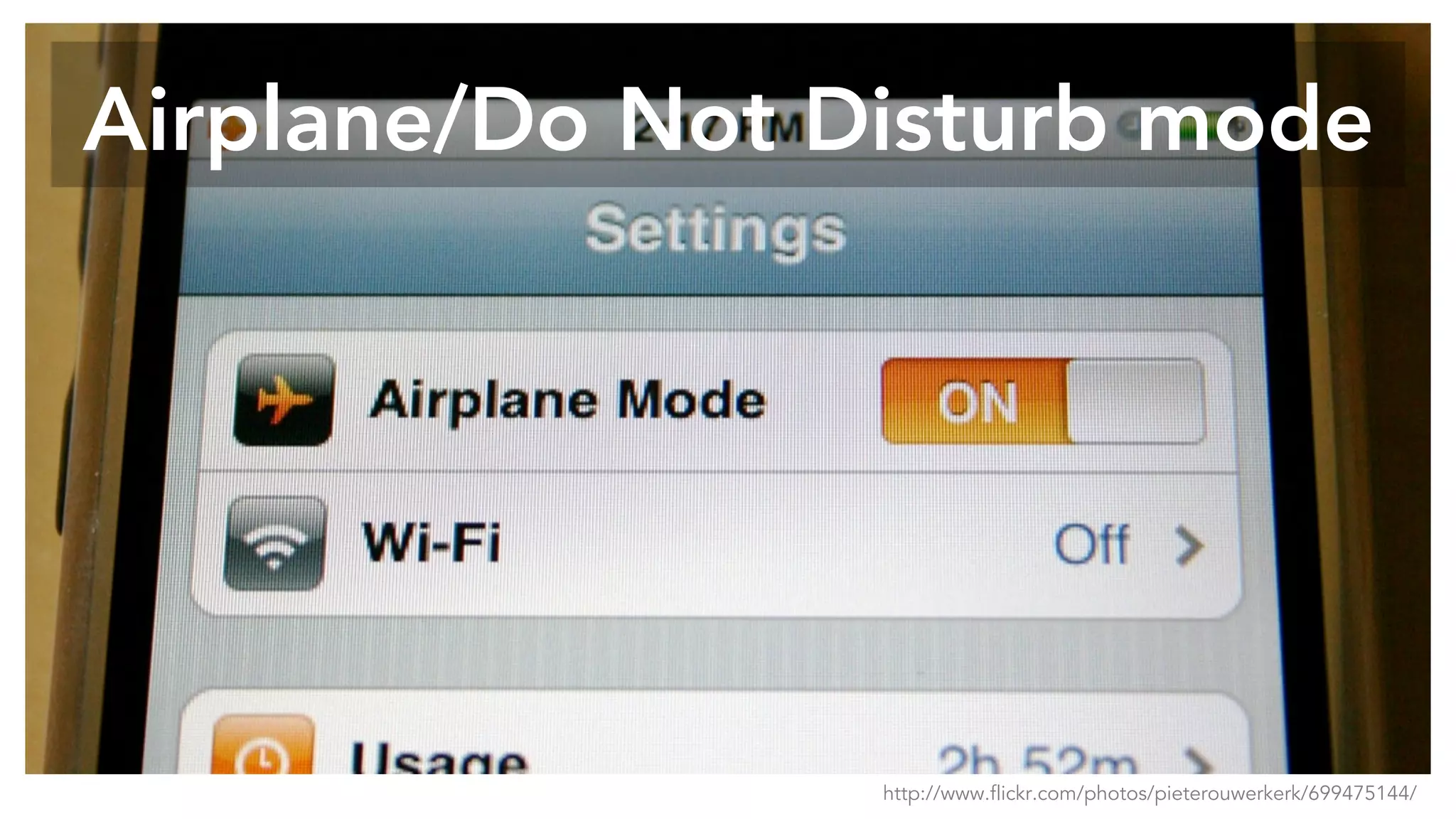 Airplane/Do Not Disturb mode
http://www.flickr.com/photos/pieterouwerkerk/699475144/
 