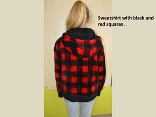 Sweatshirt with black and
red squares .
 
