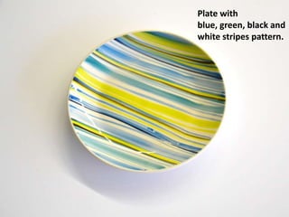 Plate with
blue, green, black and
white stripes pattern.
 