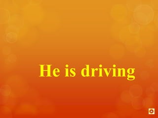 He is driving 
 