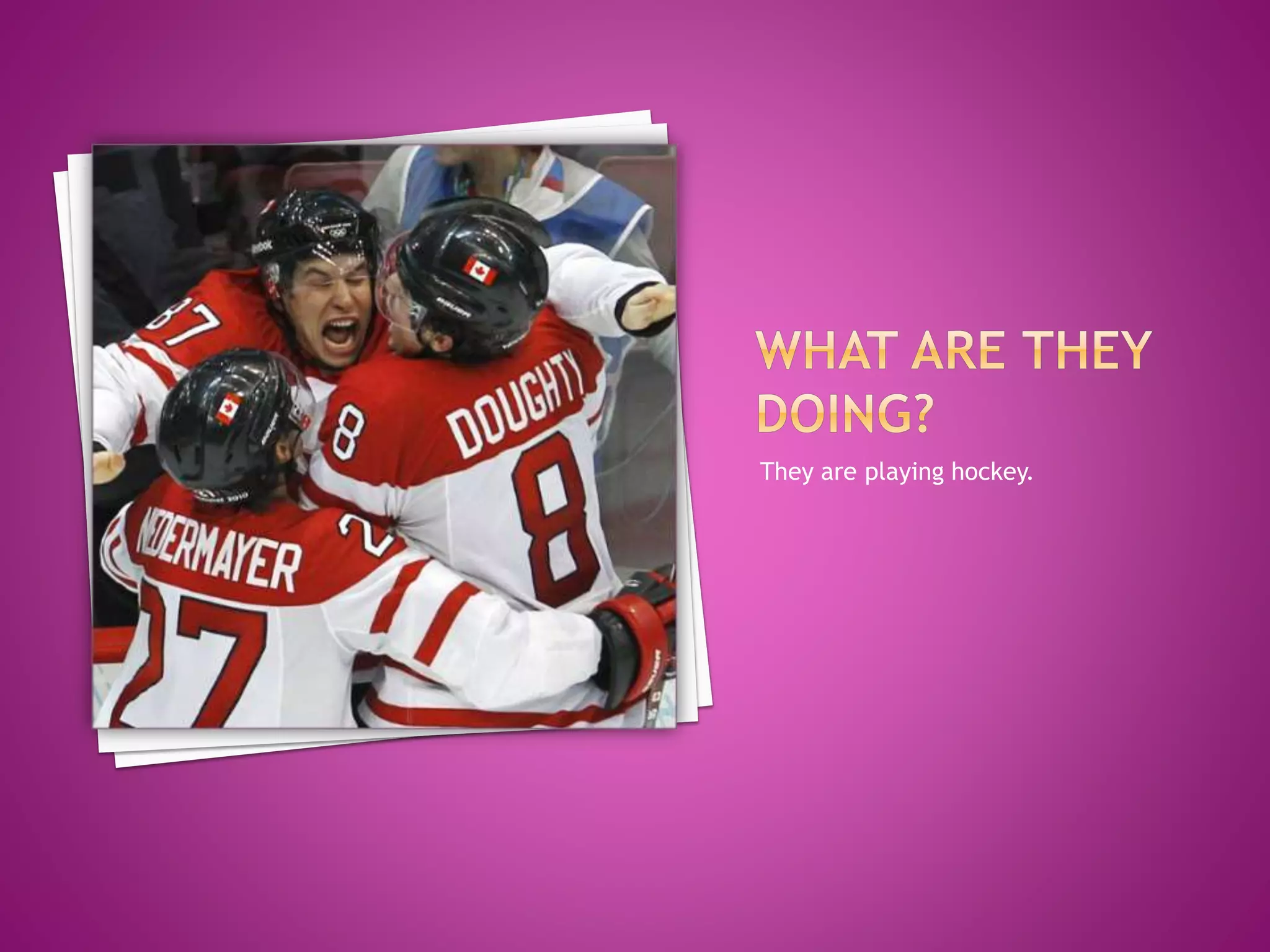 They are playing hockey.
 