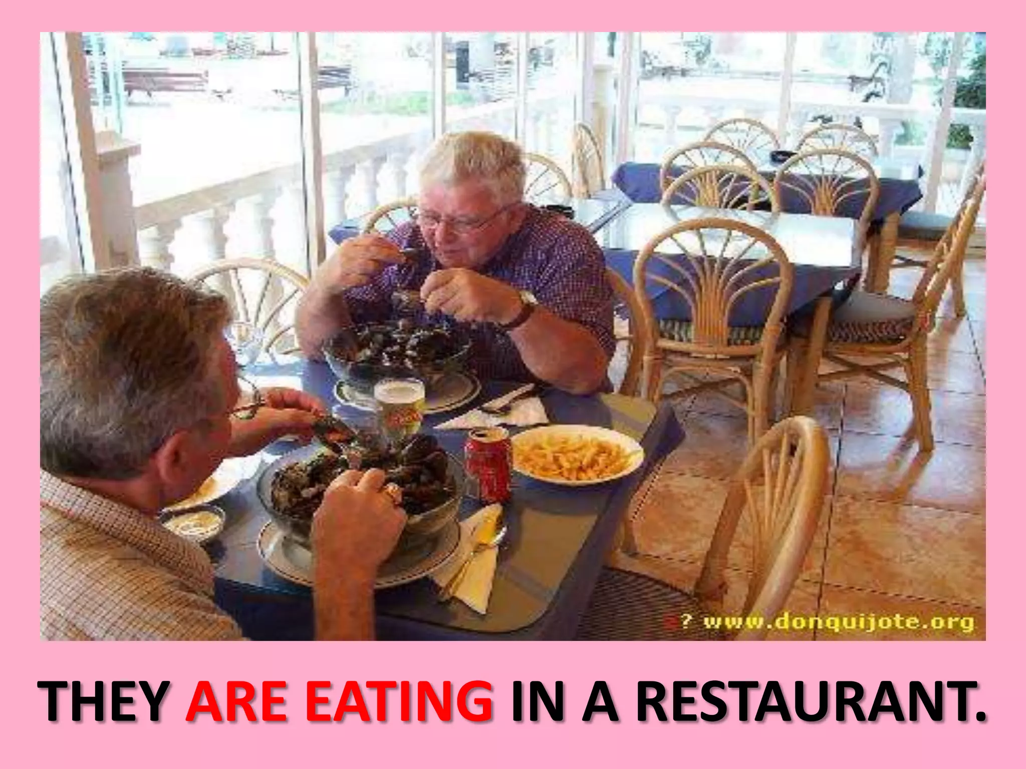 THEY ARE EATING IN A RESTAURANT.
 