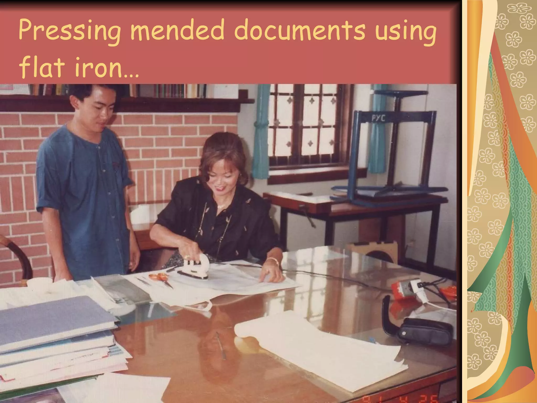 Pressing mended documents using flat iron… 