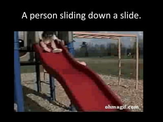 A person sliding down a slide.
 