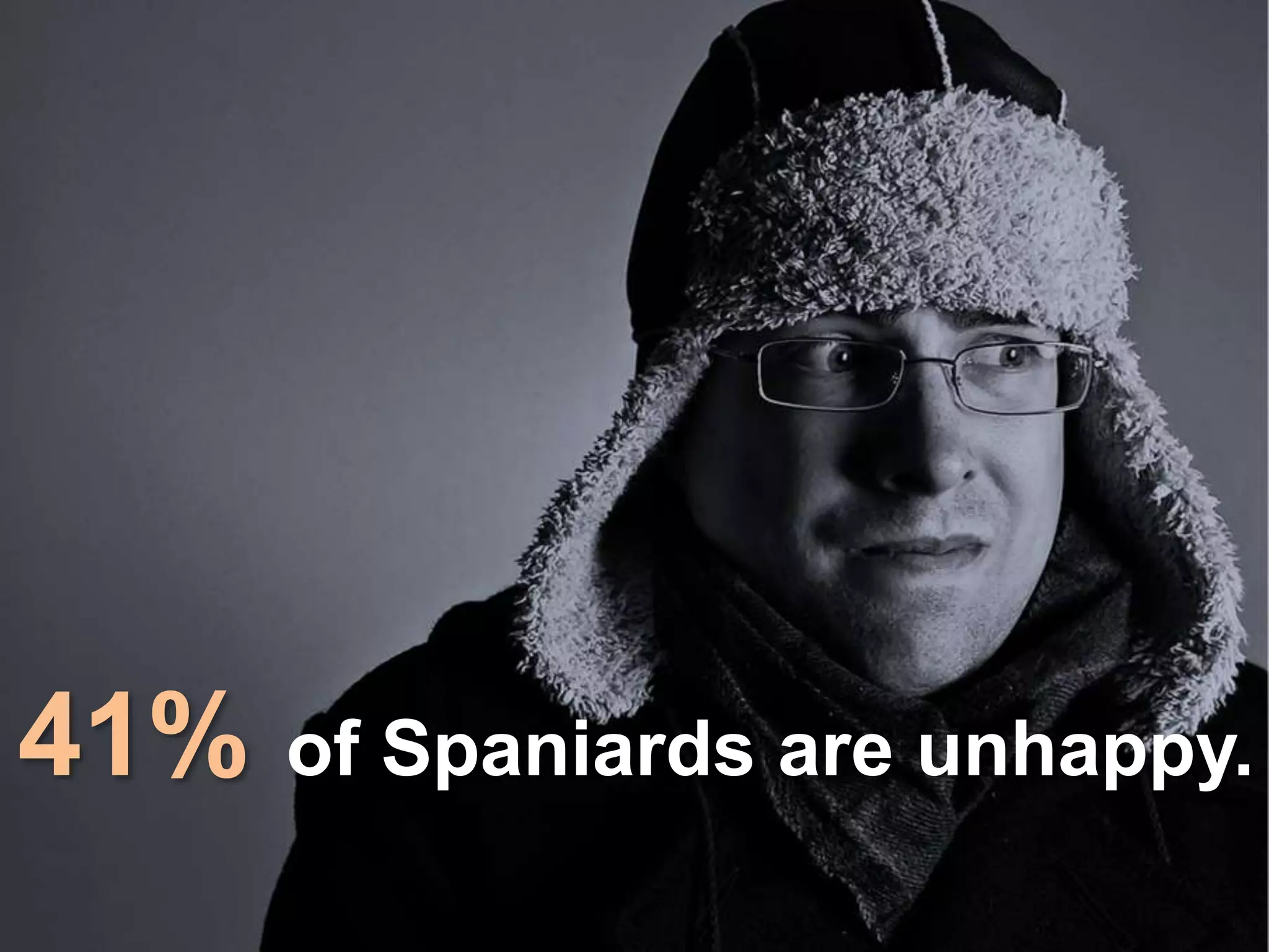 41% of Spaniards are unhappy. 
 