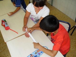 ShowingbooksaboutarchitectureI asked an architect for coming to collaborate to my school.Her name is Gisela de Luna and she was so kind to invest one day with my students for free.I arranged a meeting some days before to talk about the programming of the day.We decided she’ll talk about :What she does at work,