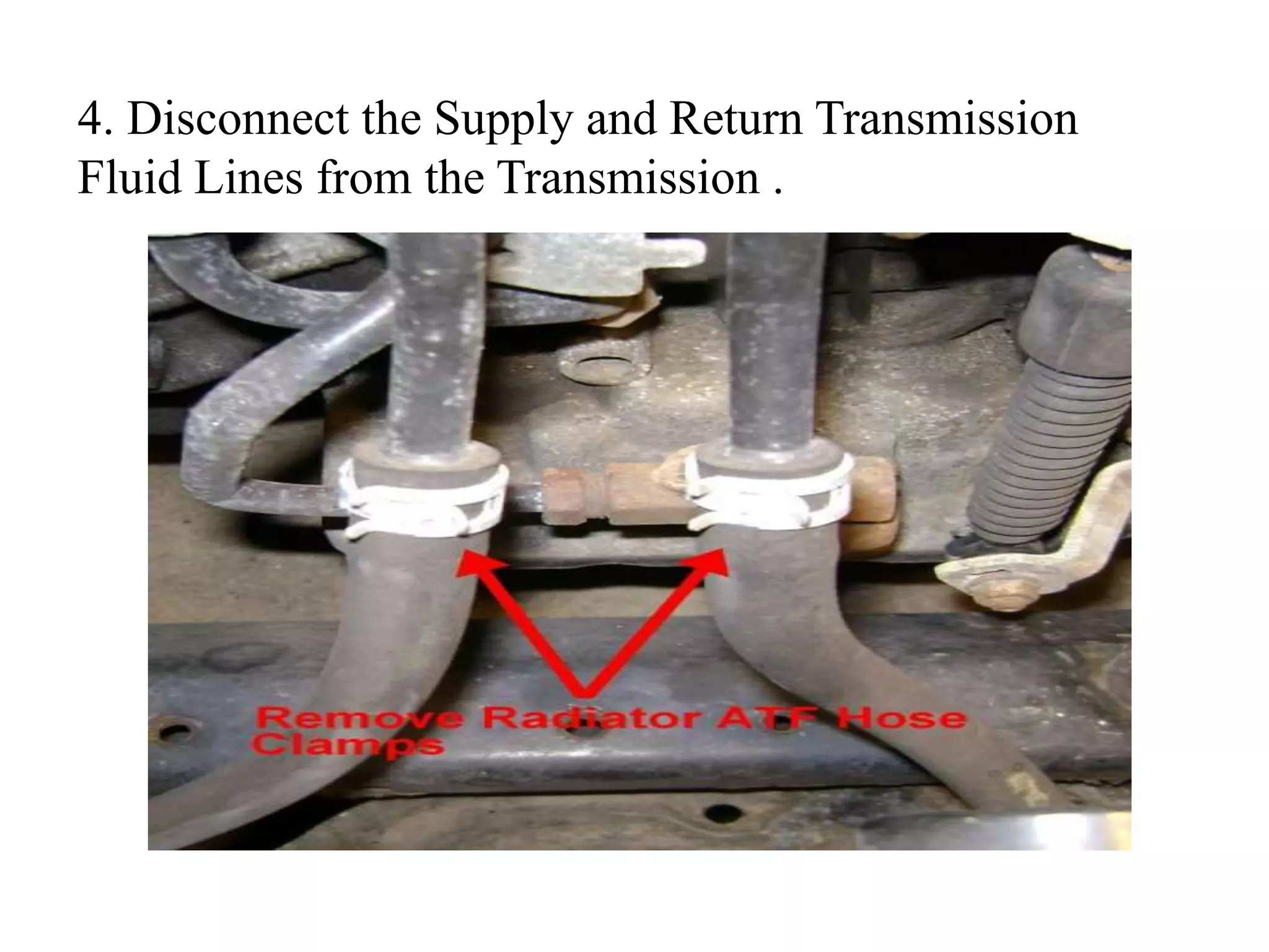 4. Disconnect the Supply and Return Transmission
Fluid Lines from the Transmission .
 