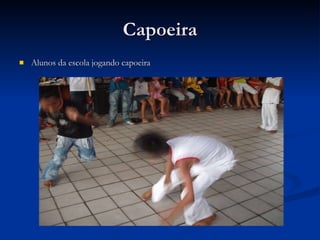 Capoeira Alunos da escola jogando capoeira 