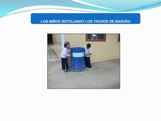 LOS NIÑOS ROTULANDO LOS TACHOS DE BASURA