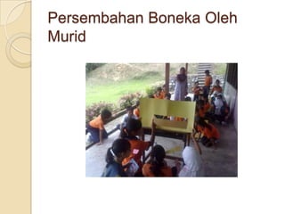 Persembahan Boneka Oleh
Murid
 