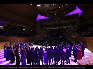 About 1,000 high school students sing "Purple Rain" at Walt Disney Concert Hall, which is illuminated purple in Downtown Los Angeles. REUTERS/Mario Anzuoni
 
