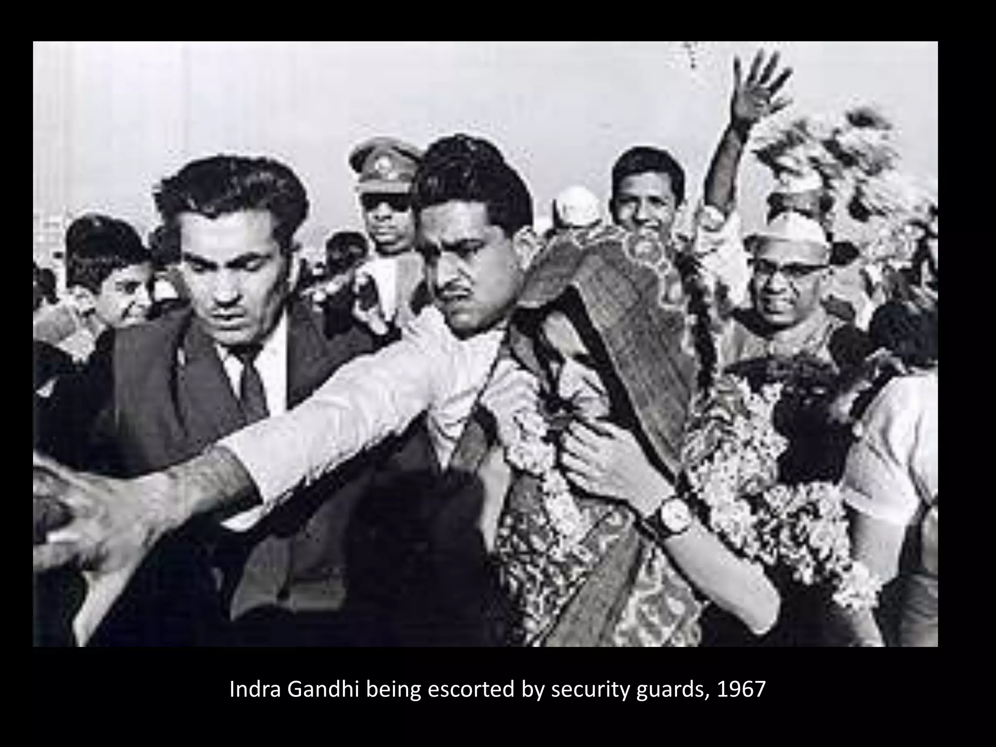 Indra Gandhi being escorted by security guards, 1967