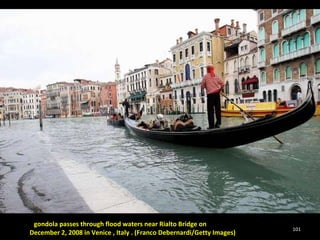A  gondola passes through flood waters near Rialto Bridge on  December 2, 2008 in Venice , Italy . (Franco Debernardi/Getty Images) 