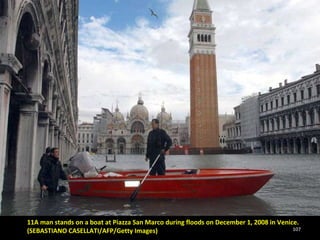 11A man stands on a boat at Piazza San Marco during floods on December 1, 2008 in Venice. (SEBASTIANO CASELLATI/AFP/Getty Images) 