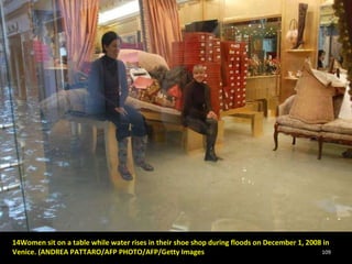 14Women sit on a table while water rises in their shoe shop during floods on December 1, 2008 in Venice. (ANDREA PATTARO/AFP PHOTO/AFP/Getty Images 