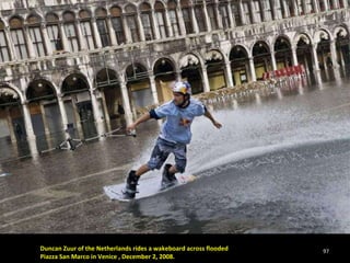 Duncan Zuur of the Netherlands rides a wakeboard across flooded  Piazza San Marco in Venice , December 2, 2008.   