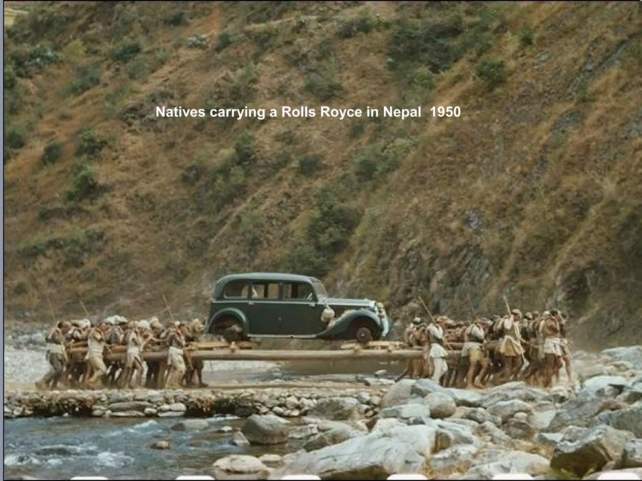 Natives carrying a Rolls Royce in Nepal 1950
 