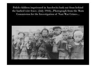 Polish children imprisoned in Auschwitz look out from behind
the barbed wire fence. (July 1944)...Photograph from the Main
    Commission for the Investigation of Nazi War Crimes...
 