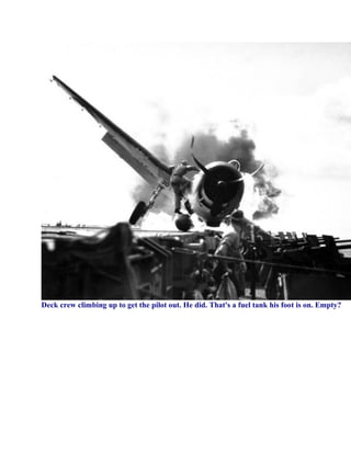 Deck crew climbing up to get the pilot out. He did. That's a fuel tank his foot is on. Empty?
 