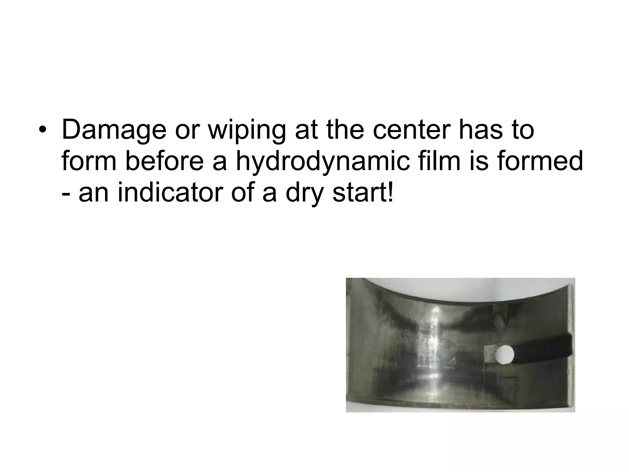 Damage or wiping at the center has to form before a hydrodynamic film is formed - an indicator of a dry start!  