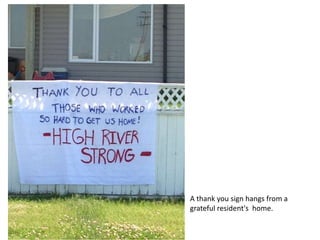 A thank-you sign hangs from a
grateful resident's home.
 