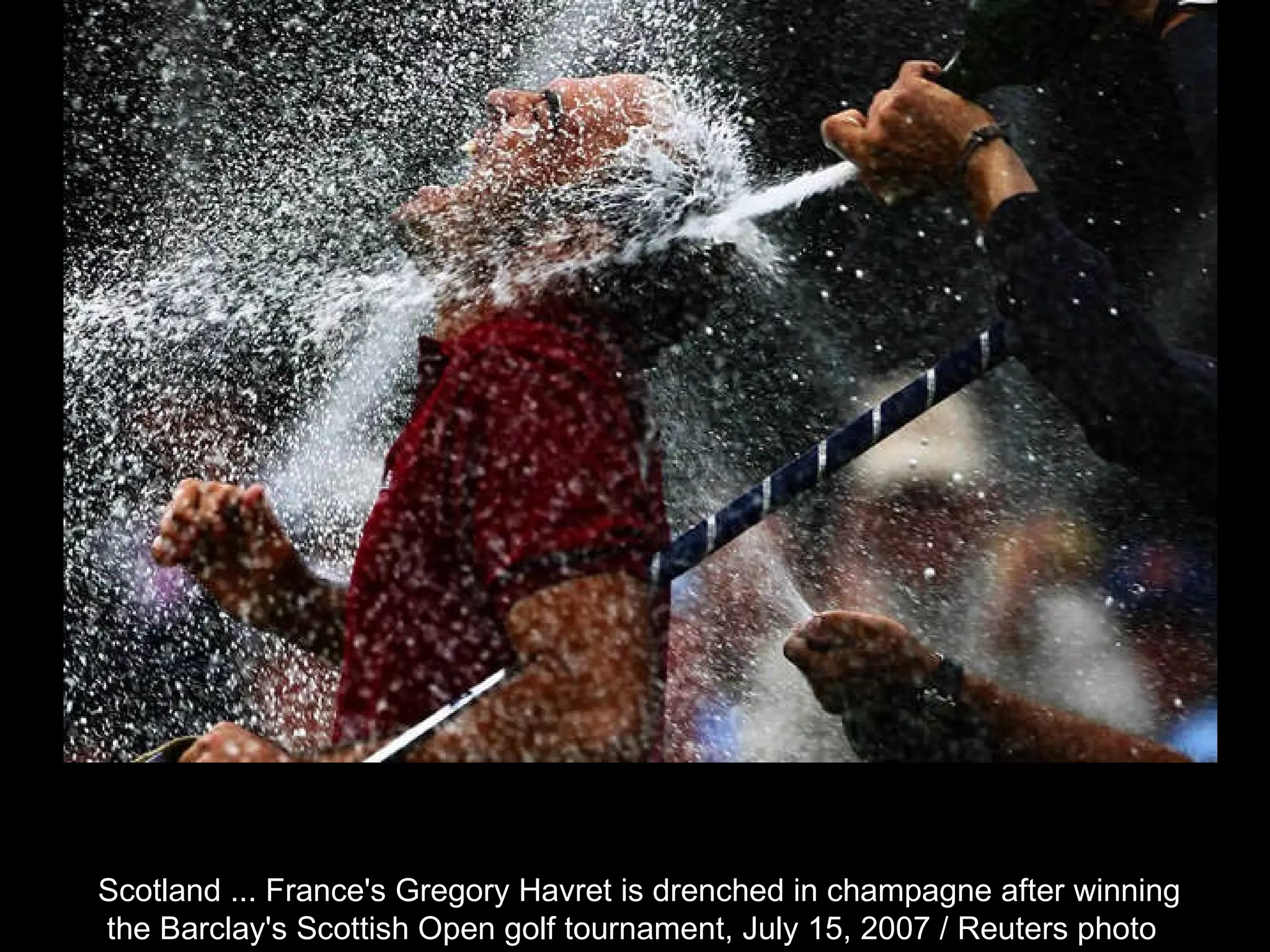 Scotland ... France's Gregory Havret is drenched in champagne after winning the Barclay's Scottish Open golf tournament, July 15, 2007 / Reuters photo  
