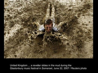 United Kingdom ... a reveller slides in the mud during the  Glastonbury music festival in Somerset, June 22, 2007 / Reuters photo  