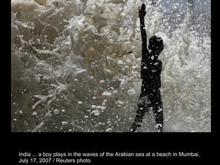 India ... a boy plays in the waves of the Arabian sea at a beach in Mumbai,  July 17, 2007 / Reuters photo  