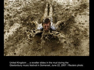 United Kingdom ... a reveller slides in the mud during the  Glastonbury music festival in Somerset, June 22, 2007 / Reuters photo  