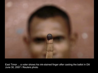 East Timor ... a voter shows his ink-stained finger after casting the ballot in Dili  June 30, 2007 / Reuters photo  