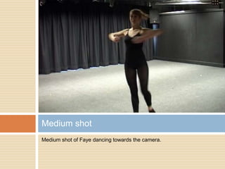 Medium shot of Faye dancing towards the camera.Medium shot