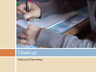 Close up of Faye writing.Close up